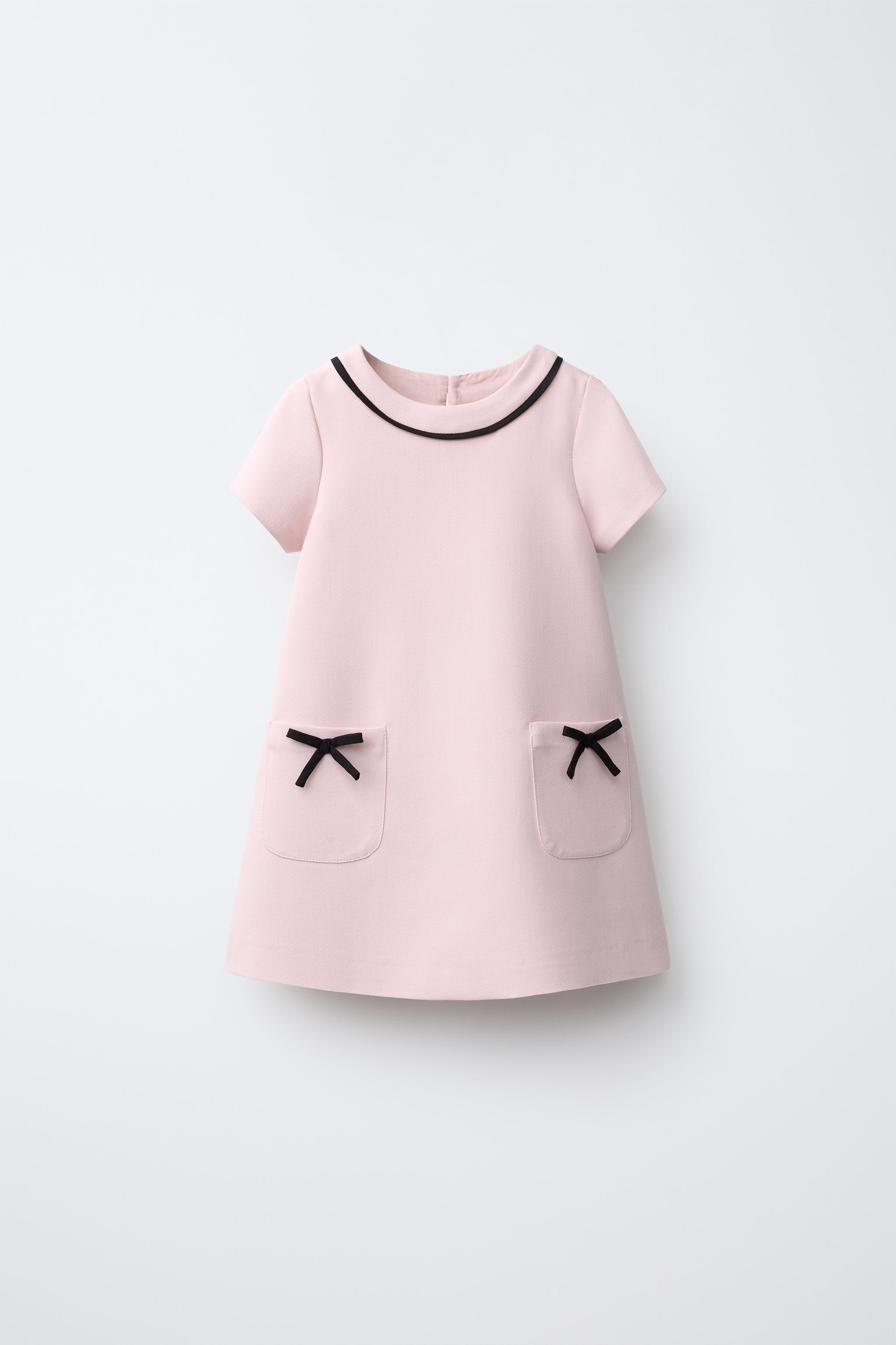 CONTRAST PIPING AND BOW DRESS