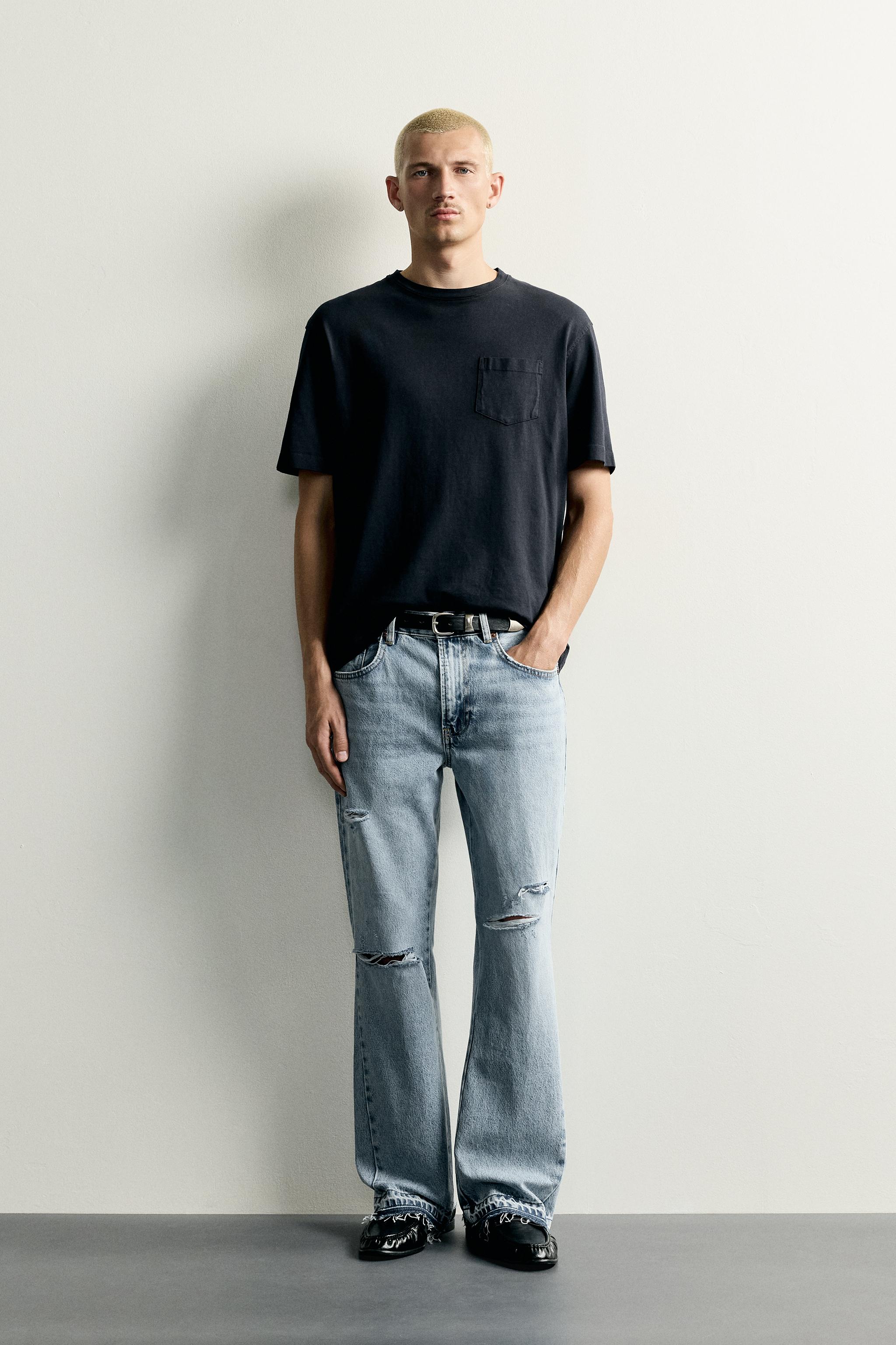 DISTRESSED FLARE FIT JEANS