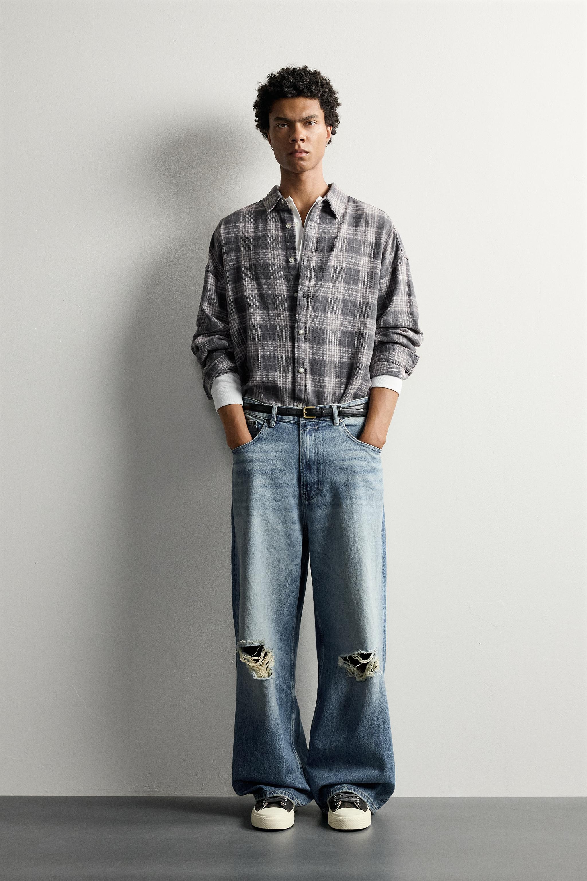 DISTRESSED BAGGY FIT JEANS