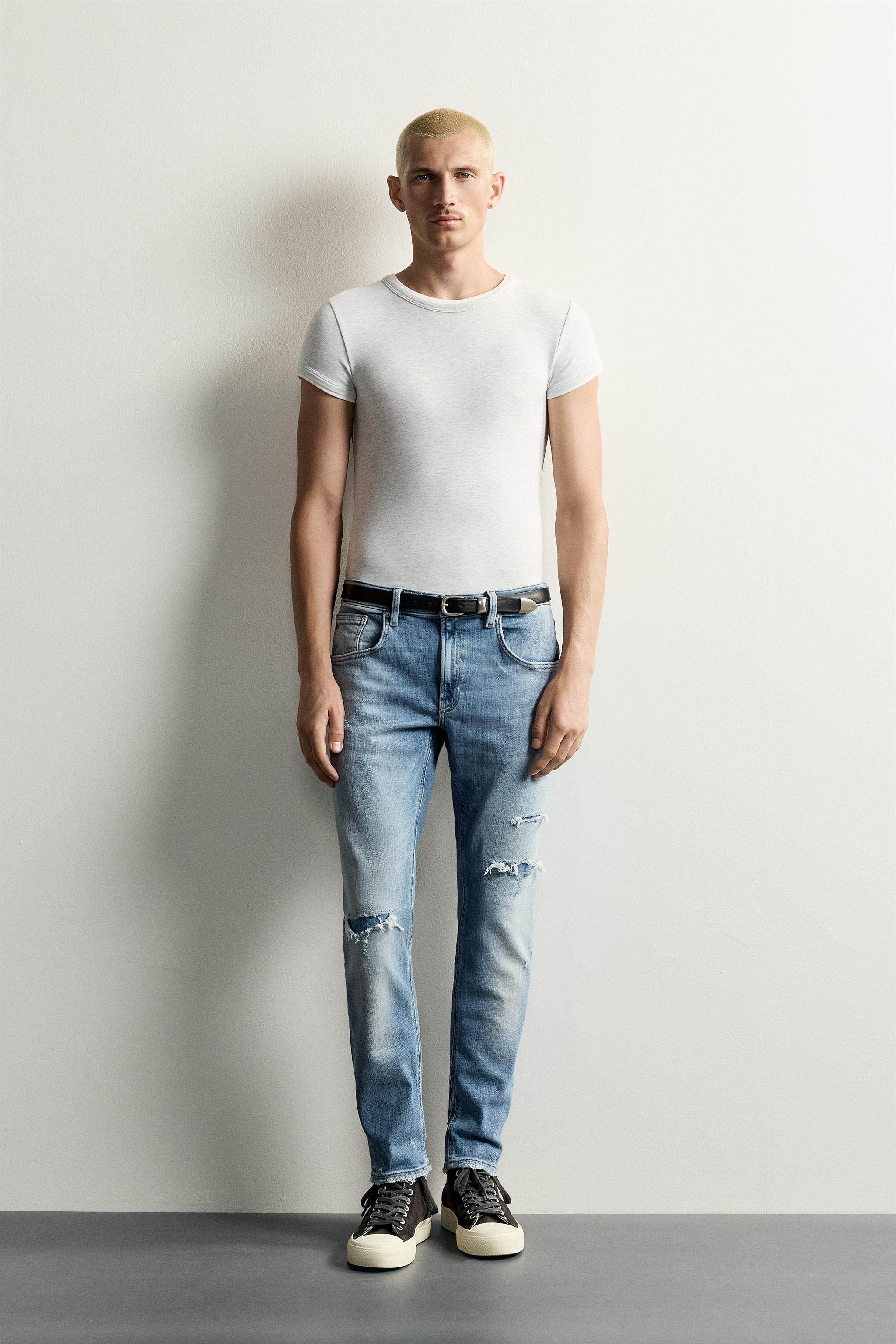 DISTRESSED SKINNY FIT JEANS