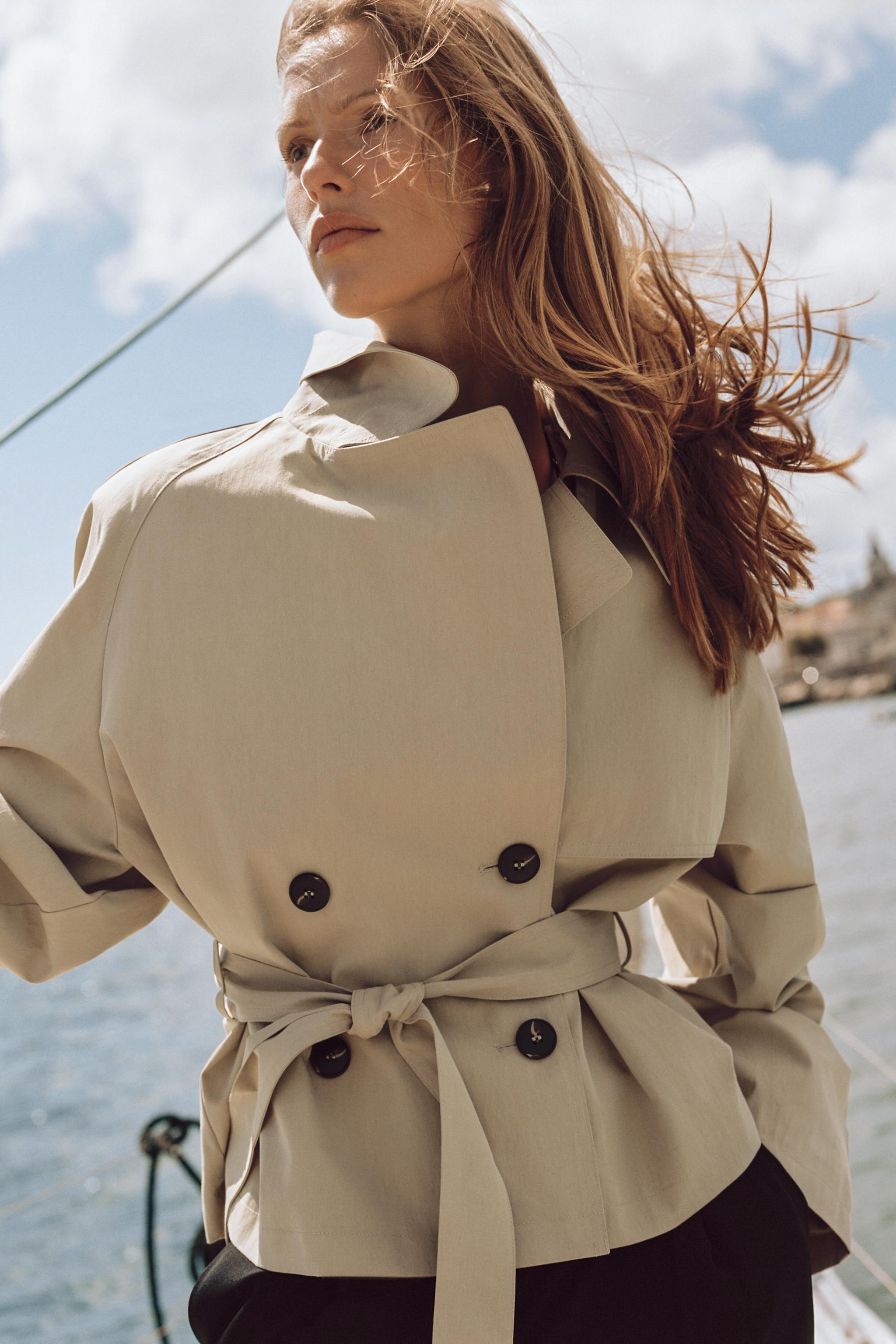 SHORT TRENCH JACKET WITH SHOULDER PADS AND BELT
